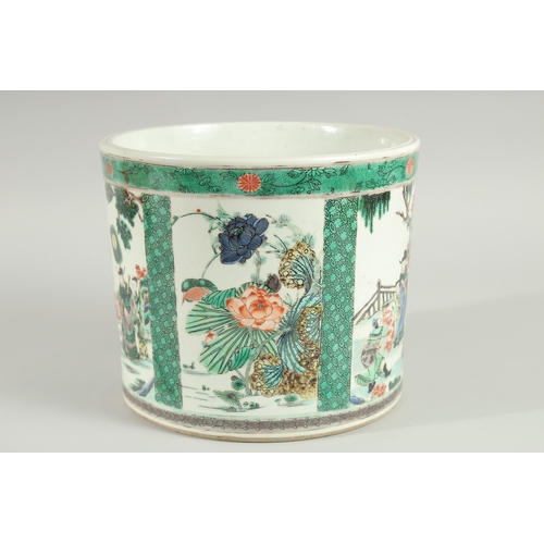 102 - A LARGE CHINESE FAMILLE VERTE PORCELAIN BRUSH POT, painted with panels of figures, flora and fauna, ... 