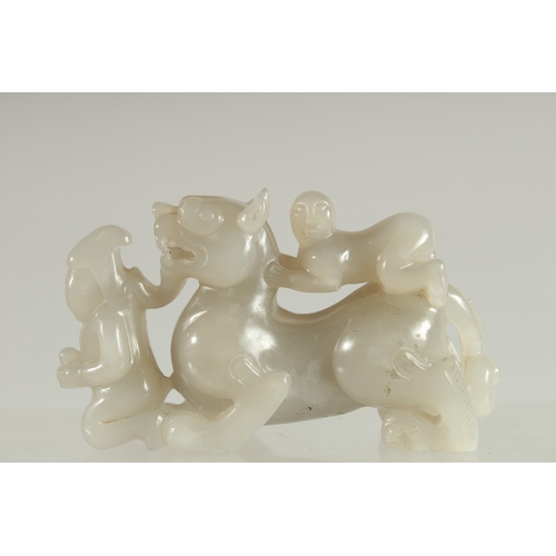 117 - A CHINESE CARVED JADE KYLIN PAPERWEIGHT, 12cm long.