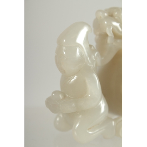 117 - A CHINESE CARVED JADE KYLIN PAPERWEIGHT, 12cm long.