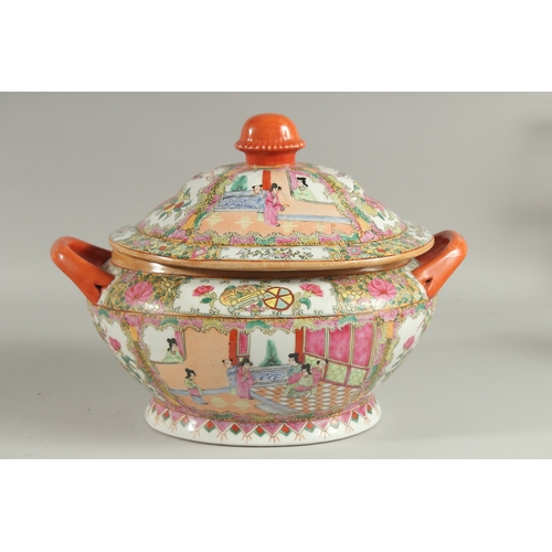 12 - A CHINESE CANTON FAMILLE ROSE PORCELAIN TUREEN AND COVER, painted with panels of scenes with figures... 