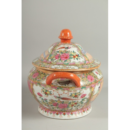 12 - A CHINESE CANTON FAMILLE ROSE PORCELAIN TUREEN AND COVER, painted with panels of scenes with figures... 