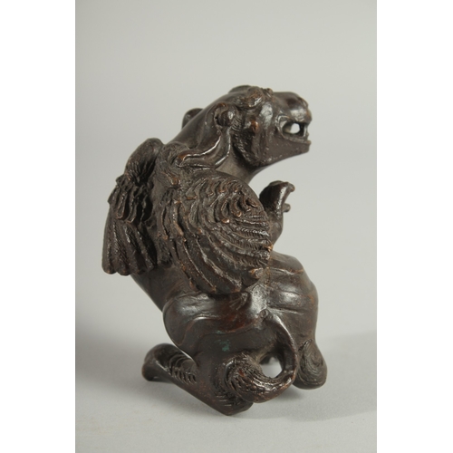 120 - A BRONZE FIGURE OF A MYTHOLOGICAL BEAST, 9.5cm high.