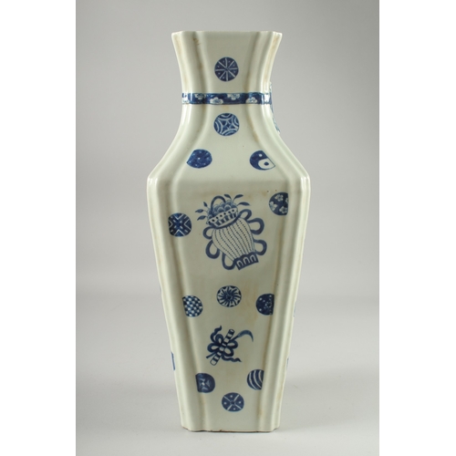 126 - A LARGE BLUE AND WHITE PORCELAIN VASE, decorated with objects and various symbols, the neck with mou... 