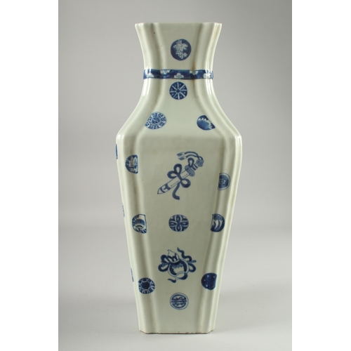 126 - A LARGE BLUE AND WHITE PORCELAIN VASE, decorated with objects and various symbols, the neck with mou... 