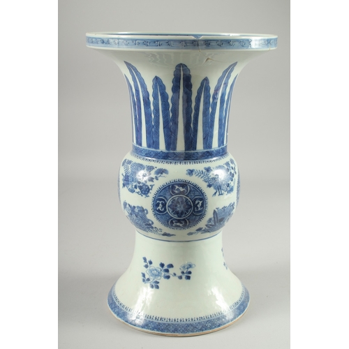 127 - A LARGE CHINESE BLUE AND WHITE PORCELAIN GU SHAPE VASE, decorated with floral motifs, (repair to rim... 