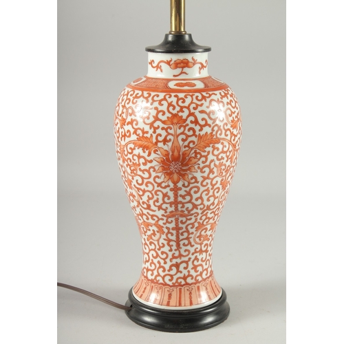 131 - A CHINESE COPPER RED AND WHITE PORCELAIN VASE LAMP, painted with floral motif decoration, the lamp w... 