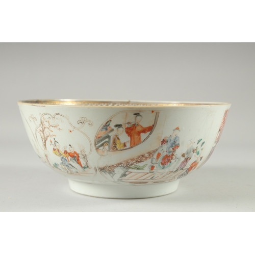 134 - A CHINESE EXPORT FAMILLE ROSE PORCELAIN BOWL, the exterior painted with panels depicting scenes with... 