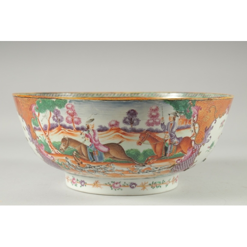 135 - A CHINESE EXPORT FAMILLE ROSE MANDARIN PATTERN PORCELAIN PUNCH BOWL, the exterior painted with two p... 