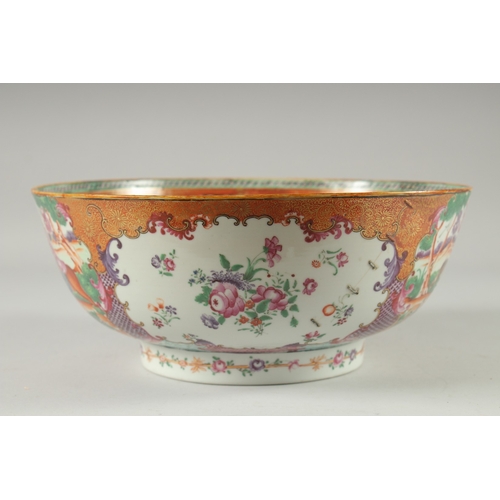 135 - A CHINESE EXPORT FAMILLE ROSE MANDARIN PATTERN PORCELAIN PUNCH BOWL, the exterior painted with two p... 