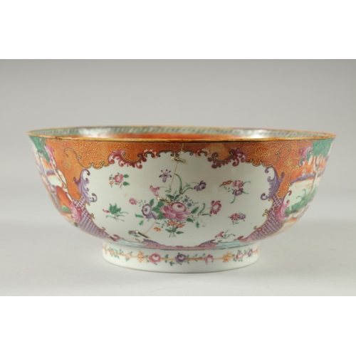 135 - A CHINESE EXPORT FAMILLE ROSE MANDARIN PATTERN PORCELAIN PUNCH BOWL, the exterior painted with two p... 