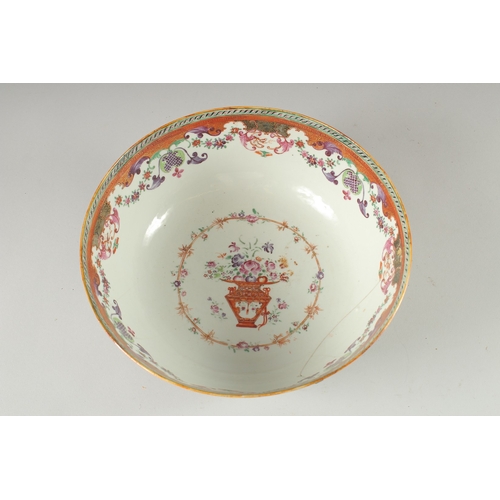 135 - A CHINESE EXPORT FAMILLE ROSE MANDARIN PATTERN PORCELAIN PUNCH BOWL, the exterior painted with two p... 