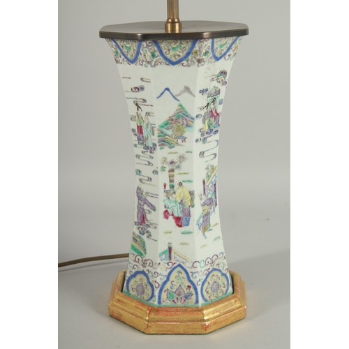 161 - A 19TH CENTURY FAMILLE VERTE PORCELAIN OCTAGONAL VASE, converted to a lamp, painted with various fig... 