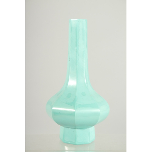 176 - A FINE TURQUOISE PEKING GLASS OCTAGONAL VASE, 19cm high.