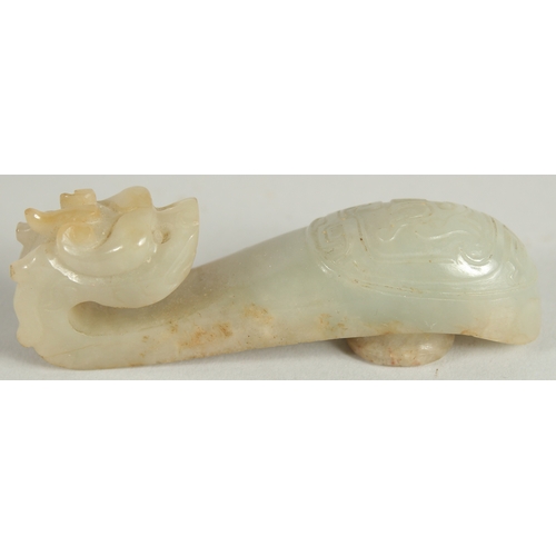 177 - A 19TH CENTURY CHINESE CARVED JADE BELT HOOK, in the form of a dragon, 8.5cm long.