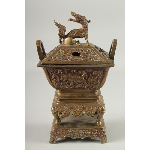 19 - A CHINESE BRASS CENSER, with beast-form finial, 30cm high.