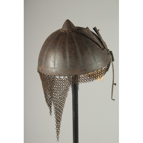 193 - A QAJAR GOLD DAMASCENED STEEL HELMET, with retractable nose guard and chain mail neck skirt, the int... 