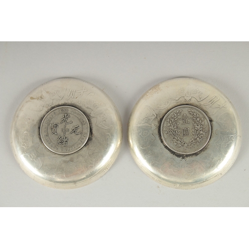 20 - TWO CHINESE COIN DISHES, 9cm diameter.