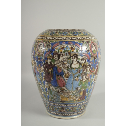 200 - A FINE AND LARGE PERSIAN QAJAR POLYCHROME GLAZED POTTERY VASE, painted with panels depicting scenes ... 