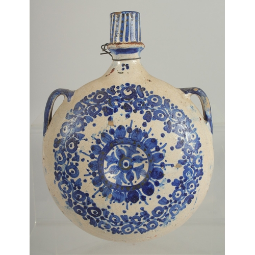 201 - A 19TH CENTURY MOROCCAN POTTERY PILGRIM WATER FLASK, 21.5cm high.