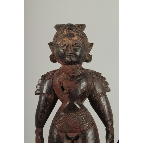 202 - TWO 19TH CENTURY SOUTH INDIAN -POSSIBLY TAMIL NADU CARVED WOOD FIGURES, 32cm and 30cm high.