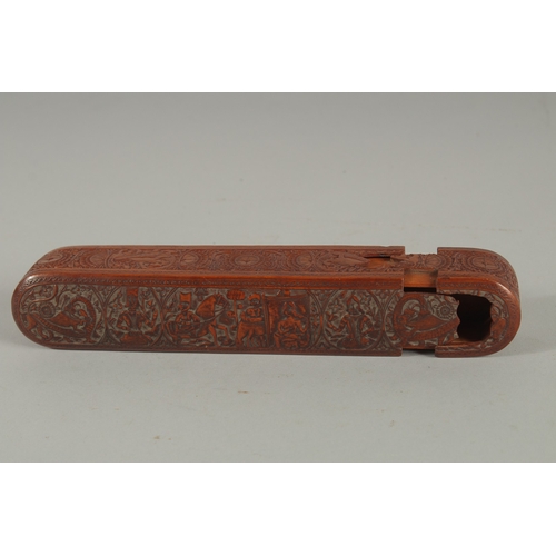 204 - A FINE 19TH CENTURY PERSIAN QAJAR ABADEH CARVED WOODEN QALAMDAN PEN BOX, 21cm long.