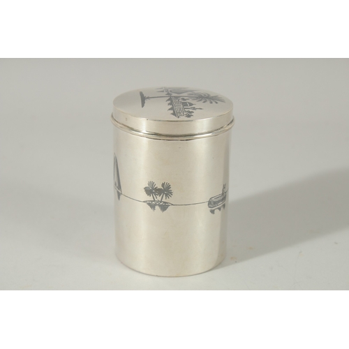 208 - A FINE IRAQI NIELLO INLAID SILVER CYLINDRICAL BOX; possibly a tea caddy, 9cm high.