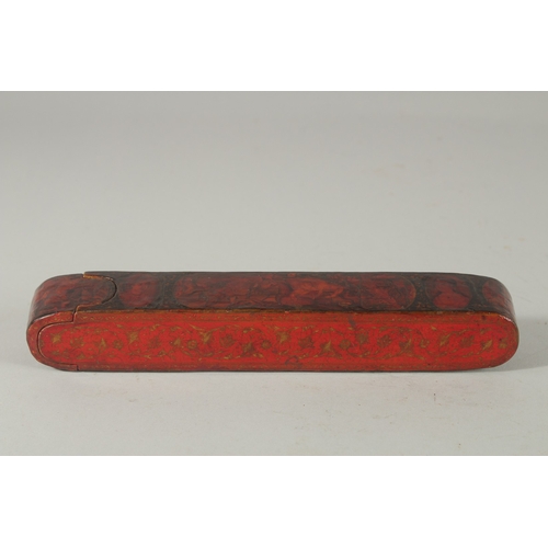 211 - A FINE 19TH CENTURY PERSIAN QAJAR LACQUERED PAPIER-MACHE QALAMDAN PEN BOX, 22.5cm long.