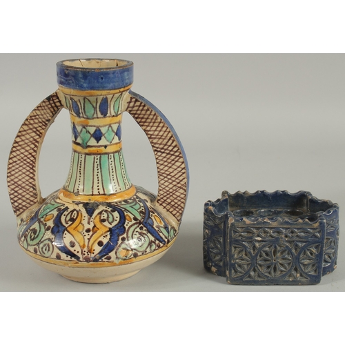 221 - A MOROCCAN TWIN HANDLED VASE AND ANOTHER BLUE GLAZE INKWELL, (2).