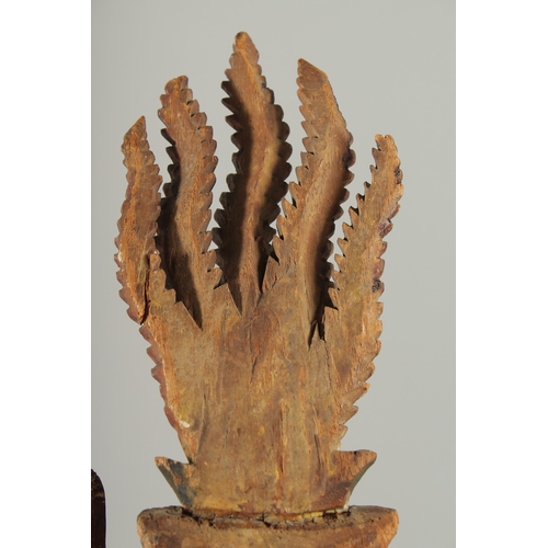 227 - AN 18TH-19TH CENTURY SOUTH EAST ASIAN LACQUERED CARVED WOODEN PHOENIX, possibly Thai, 30cm long.