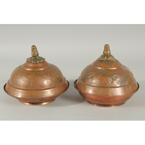 230 - A RARE PAIR OF 18TH CENTURY OTTOMAN TURKISH GILDED COPPER TOMBAK LIDDED DISHES, 16.5cm diameter.