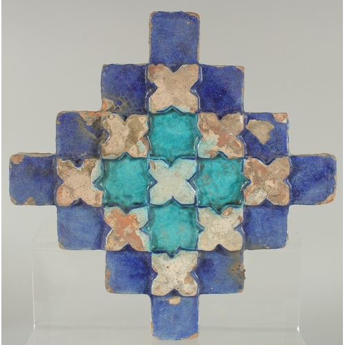 233 - A FINE 18TH-19TH CENTURY INDIAN MULTAN GLAZED POTTERY TILE, with raised geometric design, 23cm x 23c... 