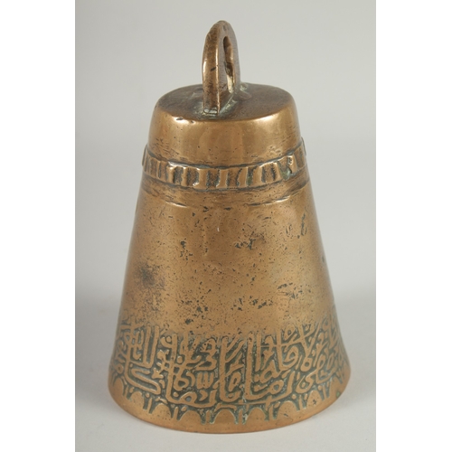 234 - AN 18TH CENTURY ISLAMIC BRASS BELL, with a band of calligraphic inscription, 17.5cm high.