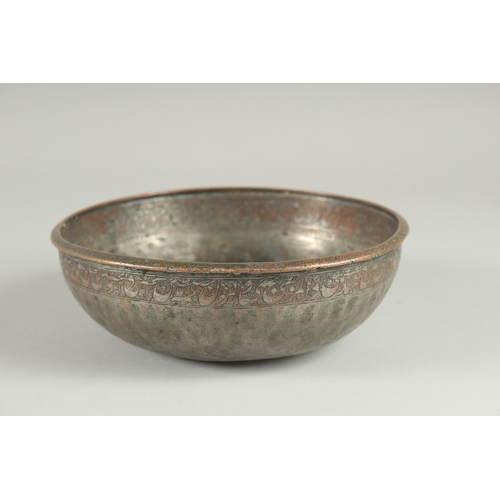 235 - A 17TH CENTURY SAFAVID IRAN TINNED COPPER BOWL, with bands of engraved calligraphic inscription, 16.... 