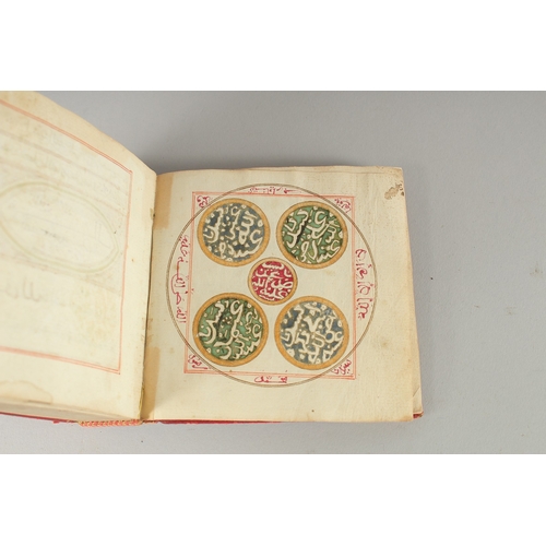 241 - A 19TH CENTURY MOROCCAN LEATHER BOUND DALA'IL AL KHAYRAT, with images of Mecca and Madina with medal... 