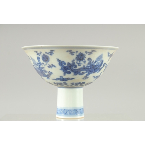 28 - A CHINESE BLUE AND WHITE PORCELAIN 'KUI DRAGON' STEM CUP, 15cm diameter.