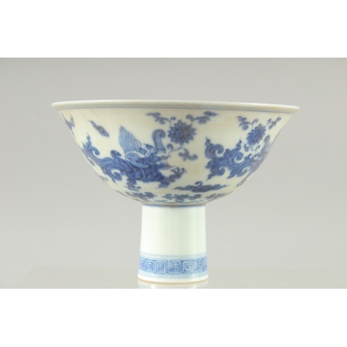 28 - A CHINESE BLUE AND WHITE PORCELAIN 'KUI DRAGON' STEM CUP, 15cm diameter.