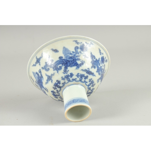 28 - A CHINESE BLUE AND WHITE PORCELAIN 'KUI DRAGON' STEM CUP, 15cm diameter.