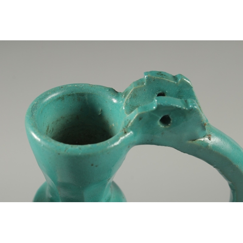 300 - A RARE 17TH-18TH CENTURY PERSAIN SAFAVID MONOCHROME TURQUOISE GLAZED POTTERY LIDDED EWER AND BASIN, ... 