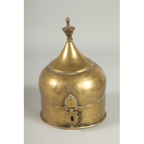 303 - A RAJASTHANI MUGHAL COPPER LIDDED CIRCUALR CADDY BOX, 19cm high, 12.5cm diameter.