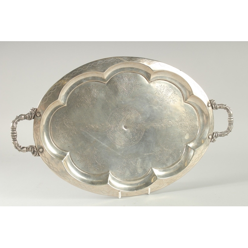 304 - A FINE SIGNED IRAQI NIELLO SILVER TWIN HANDLED TRAY, stamped to the centre, 53cm x 32cm.