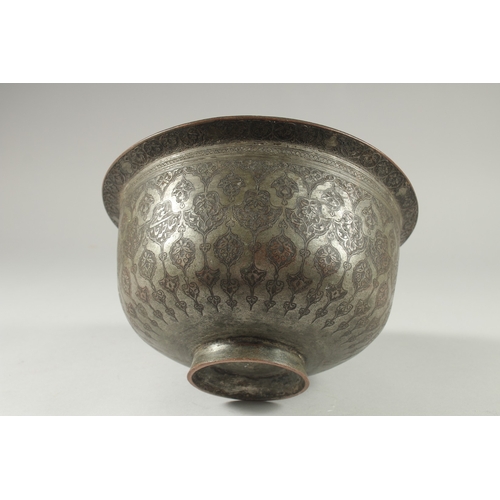 306 - A 16TH-17TH CENTURY SIGNED SAFAVID TINNED COPPER BOWL, engraved with decorative floral motifs, 25.5c... 