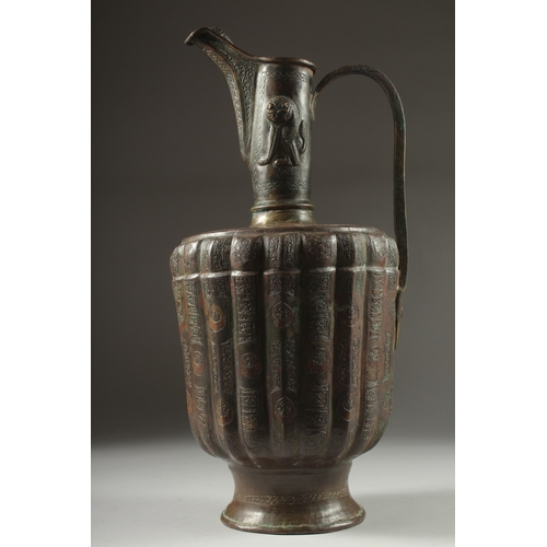 307 - A FINE LATE 12TH CENTURY KHURASAN PERSIAN SILVER AND COPPER INLAID BRASS EWER, the sheet metal beate... 