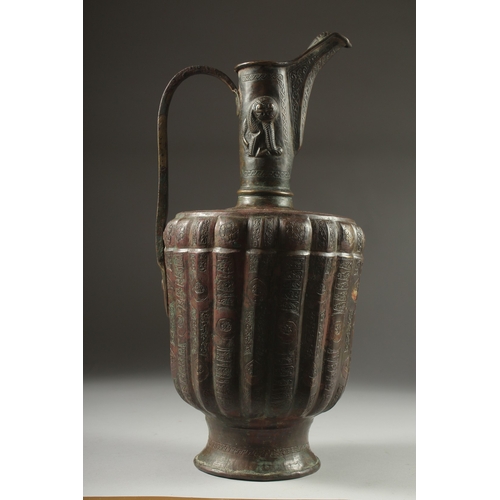 307 - A FINE LATE 12TH CENTURY KHURASAN PERSIAN SILVER AND COPPER INLAID BRASS EWER, the sheet metal beate... 