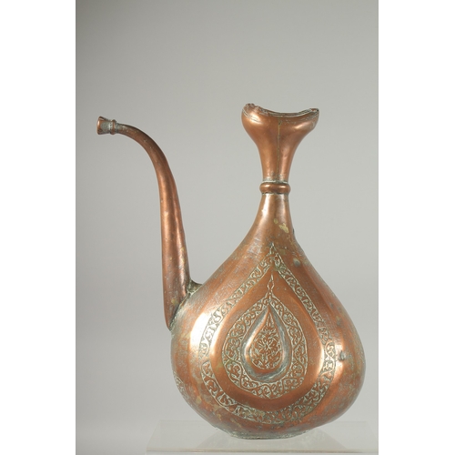 312 - A 17TH-18TH CENTURY PERSIAN SAFAVID ENGRAVED COPPER EWER, 31cm high.