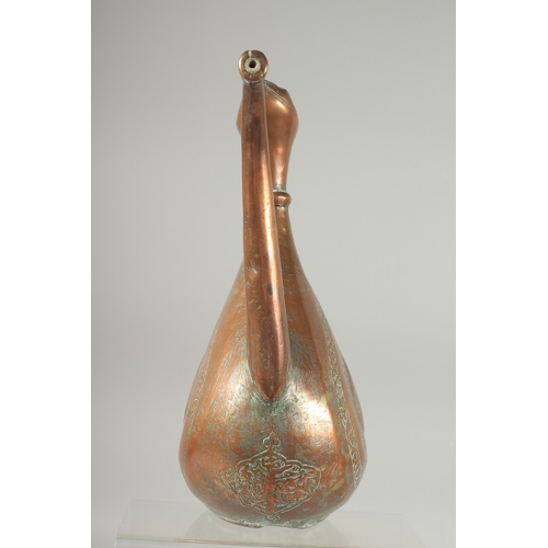 312 - A 17TH-18TH CENTURY PERSIAN SAFAVID ENGRAVED COPPER EWER, 31cm high.