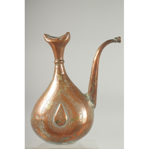 312 - A 17TH-18TH CENTURY PERSIAN SAFAVID ENGRAVED COPPER EWER, 31cm high.