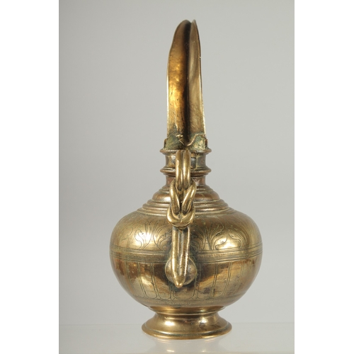 319 - A FINE 18TH-19TH CENTURY SOUTH INDIAN OR SRI LANKAN BRASS OIL POURING EWER, 25cm high.