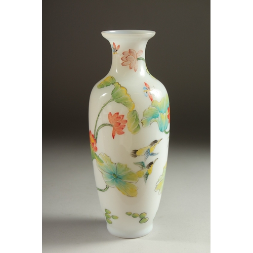 34 - A CHINESE PAINTED GLASS VASE, decorated with birds, butterflies, and flora, 23cm high.