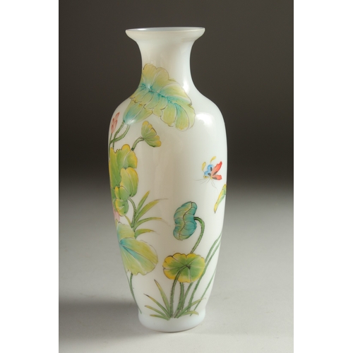 34 - A CHINESE PAINTED GLASS VASE, decorated with birds, butterflies, and flora, 23cm high.