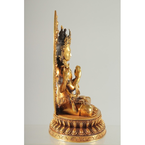 41 - A FINE TIBETAN GILDED ALLOY BUDDHA, 17cm high.